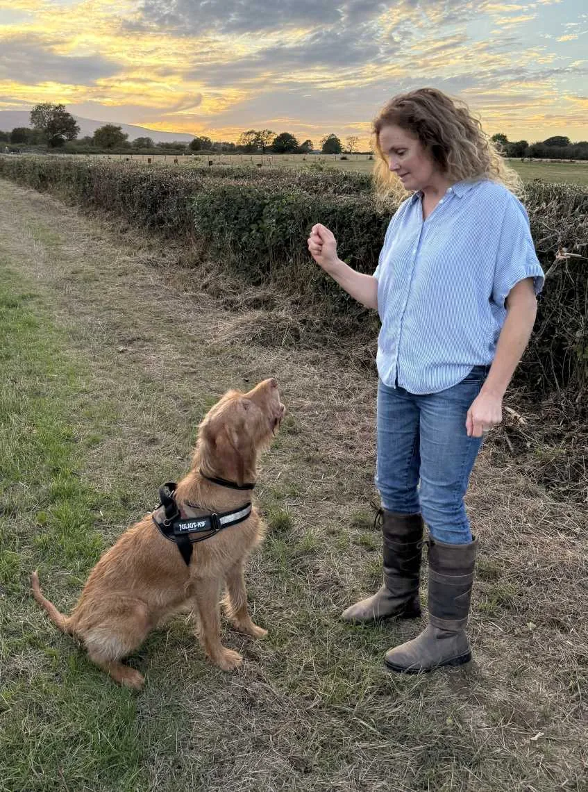 Melanie Daniels Animal Behviourist with a Dog